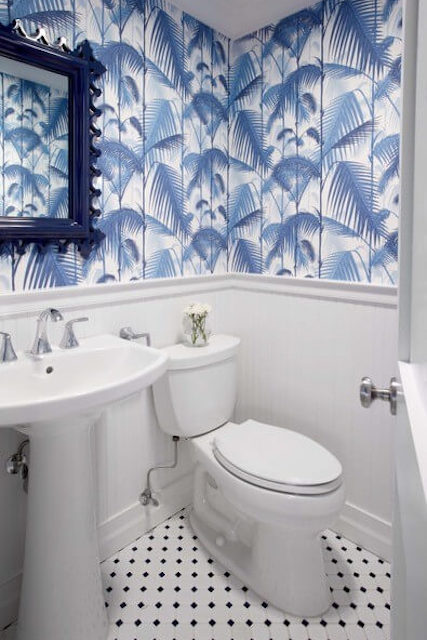 Beautiful bathroom with blue wallpaper